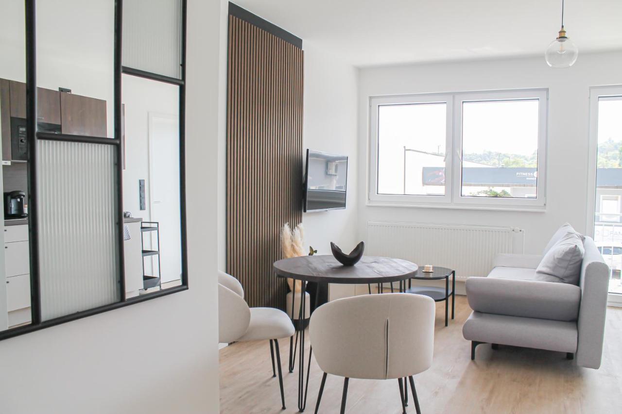 Apartment Special - Stadtnah, Balkon, Parkplatz, E-ladestation, Gitterbox Fuer Fahrraeder, Fitnessstudio *